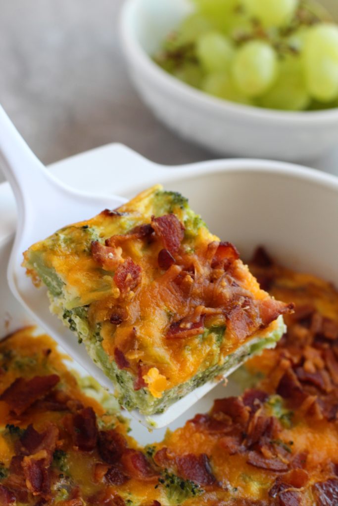 <!-- wp:paragraph -->
<p>Place steamed broccoli in the prepared casserole dish. Pour the egg mixture evenly over the top—layer on shredded cheese and crumbled bacon.</p>
<!-- /wp:paragraph -->

<!-- wp:paragraph -->
<p><strong>***If making this the night before, stop here and place it in the refrigerator. Continue the next steps in the morning. </strong></p>
<!-- /wp:paragraph -->

<!-- wp:paragraph -->
<p>Place the casserole in the preheated air fryer, and bake at 350 degrees F, air fryer setting,  for 18-23 minutes or until the egg is set and the top is a light golden brown. Remove from the oven and cool for 5-10 minutes before serving.</p>
<!-- /wp:paragraph -->